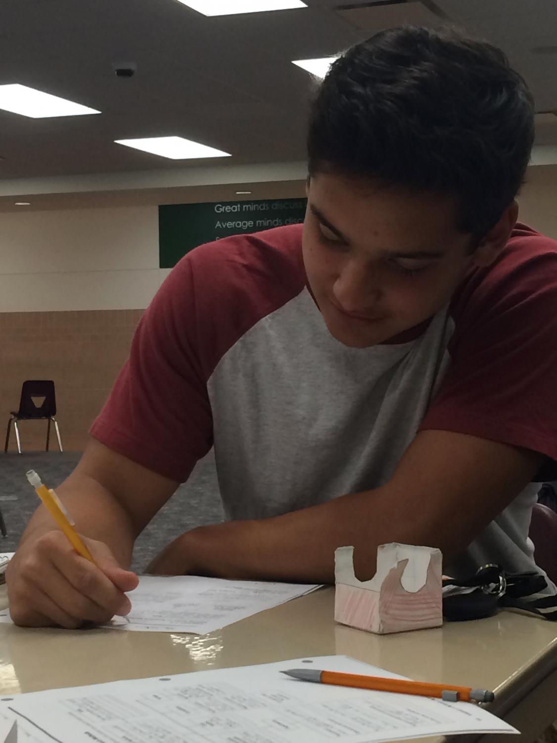 Sophomore Jake Lamarre studies in the A100 forum. Sophomores are taking the PreACT on Thursday, Nov. 8.