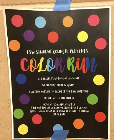 Student Council advertises their color run with posters around the school. The run will take place on Wednesday, April 12. 