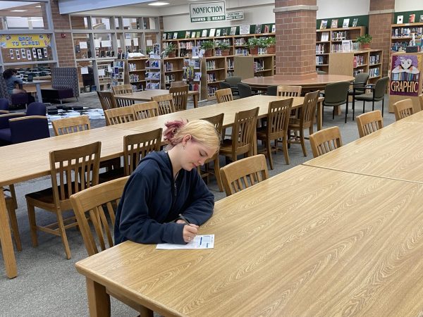 Student writes on a mock ACT bubble sheet. The next ACT is on Saturday, Oct. 28.