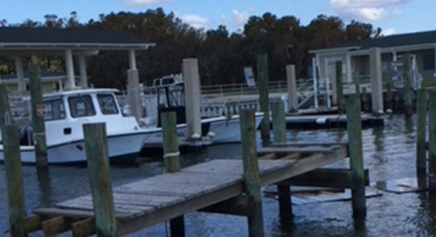 A+dock+in+a+lake+in++North+Carolina+is+broken+due+to+the+hurricane.