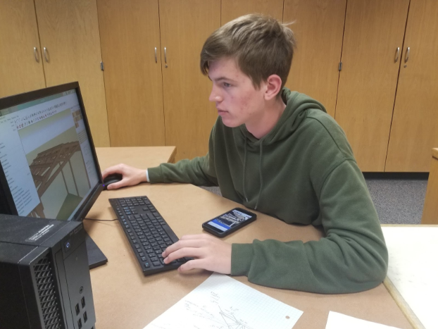 Senior gage Heithold working on designing the LSW pavilion for CAD architecture.