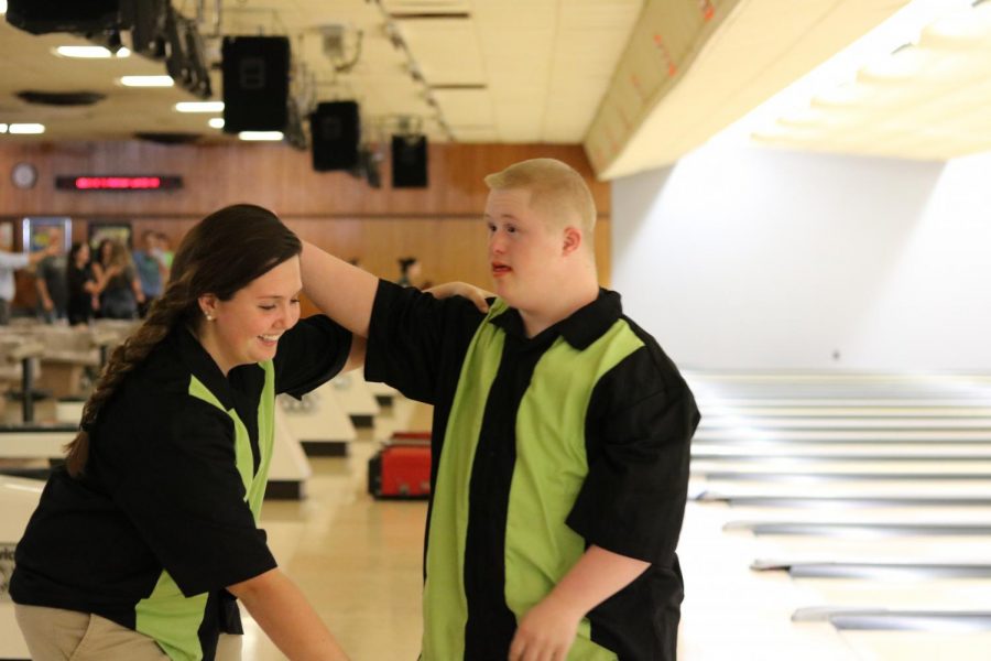 Sophomore Emma Wood and Sophomore Jeff Evans get ready to bowl at last years game against Southeast. This is the second year they will have been on a team together. 