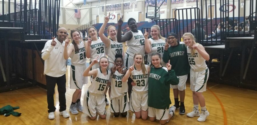 LSW+Freshman+girls+basketball+team+celebrates+their+victory.+The+girls+won+the+LPS+championship+Tuesday+night%2C+52-48.+