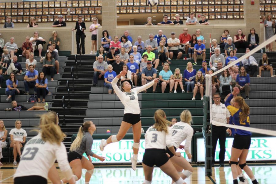 Sophomore+Shaylee+Myers+goes+up+to+spike+the+ball+at+Seward.+The+hawks+won+their+game+against+Seward+2-0.