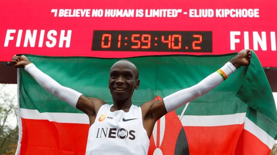 Eliud Kipchoge celebrating after his 1:59:40.2 effort early in the morning in Vieana, Austria on October 12, 2019. He is the first man to ever run under two hours.