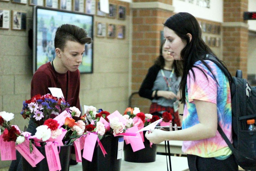 Flowers’ sales are open from Feb. 3 through Feb. 13. Senior Lawson Horner helped with flowers’ distribution on Valentines Day last year.