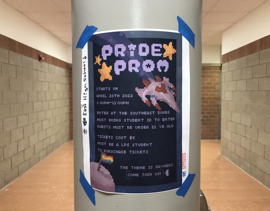 Poster for Pride Prom hanging in hallway which was hung up by GSA members. Pride Prom will be on April 28 from 8:00 p.m. to 11:00 p.m. at Lincoln East High School.