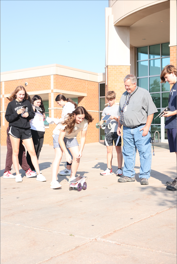 Students in Geoscience race their solar power race cars. Mr. Monroe’s Block 1 Geoscience Diff class learned about climate change and engineering for the assignment.
