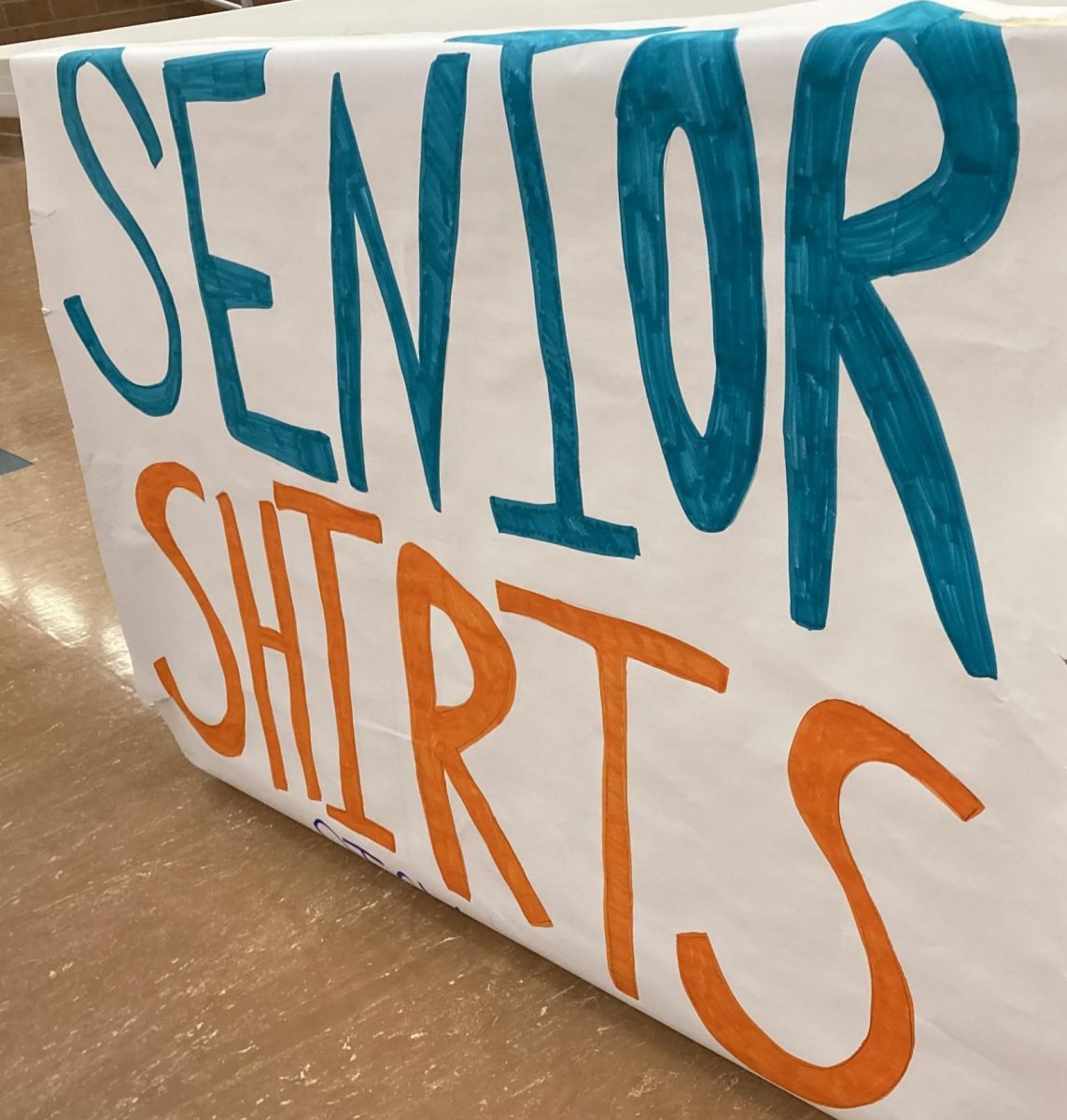 Student Council sets up a booth for seniors to pick up their senior shirts. From Wednesday, Oct. 18 to Friday, Oct. 20, senior shirts are available for pick-up by the trophy cases at the front of the school.
