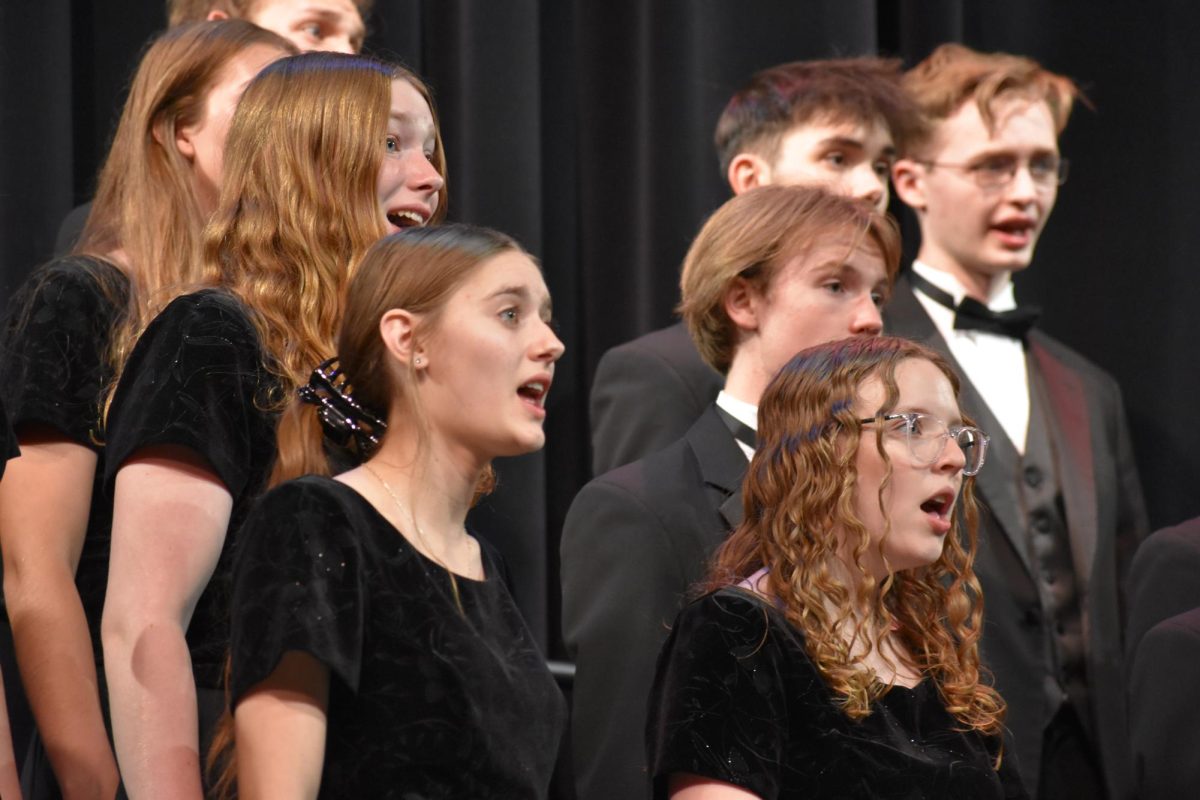 Varsity concert choir sings at their fall concert. On Sunday, Dec. 3, at 2 p.m. and 6 p.m, Lincoln Southwest (LSW) varsity concert choir will be performing at the Lied Center For Performing Arts with the Lincoln Symphony Orchestra.