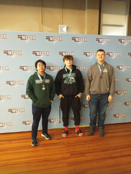 The esports team wearing their medals at the tournament at Wayne State University. Southwest placed third at the competition. 