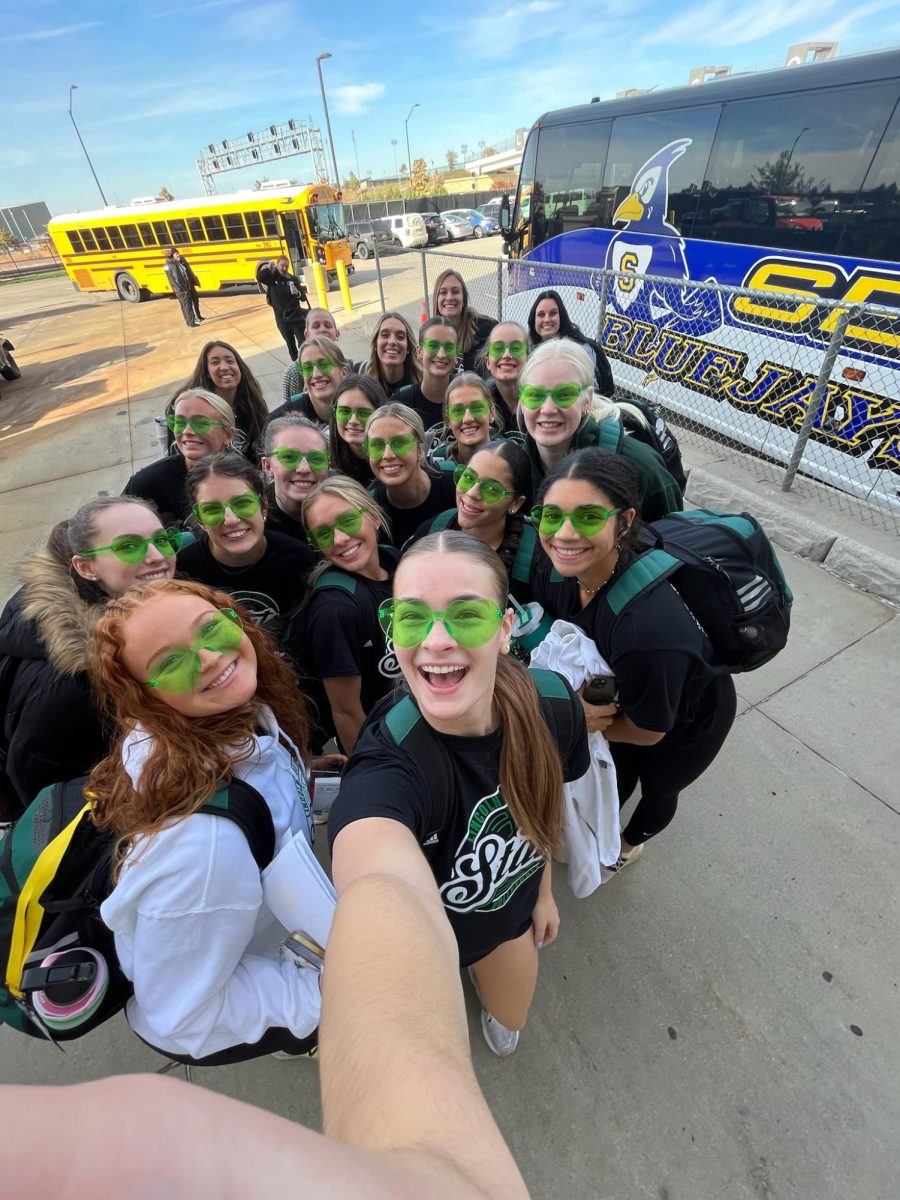 The+varsity+volleyball+team+taking+a+selfie+before+they+take+the+bus+to+Pinnacle+Bank+Arena.+The+Hawks+play+the+Pius+X+Thunderbolts+on+Wednesday%2C+Nov.+1%2C+at+5%3A00+p.m.