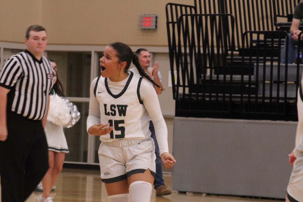 Senior guard Kennadi Williams screams after her teammate scores a basket against the Northeast Rockets. Williams finished the game with 18 points in a 57-49 victory over the Rockets. 