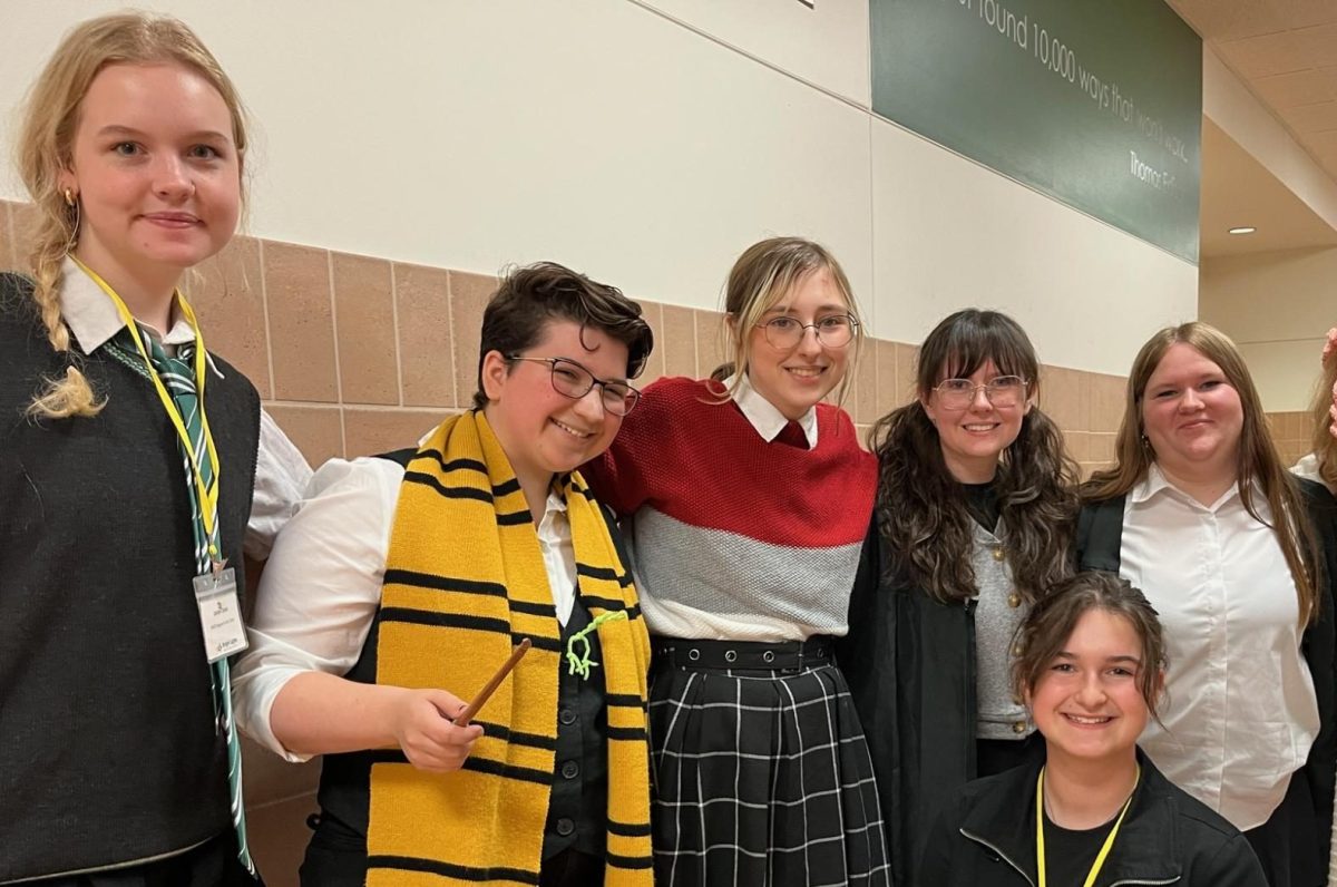 Camp assistants (CA) for Hogwarts Camp pose for a photo during dress as a Hogwarts character day. Registration to be a CA is open till the end of May. 