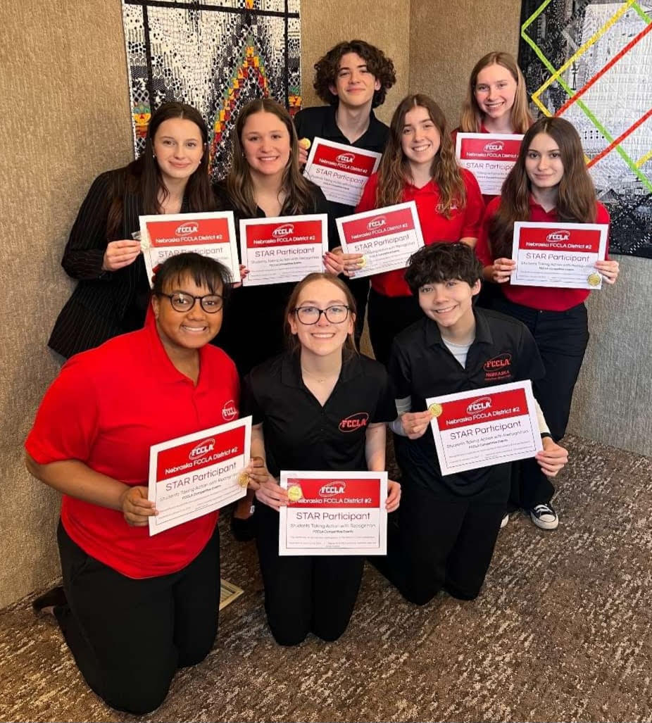 FCCLA+State+Participants.%0AAll+nine+participants+competed+at+State.+They+are+posing+for+their+photo+while+holding+up+their+certificates.