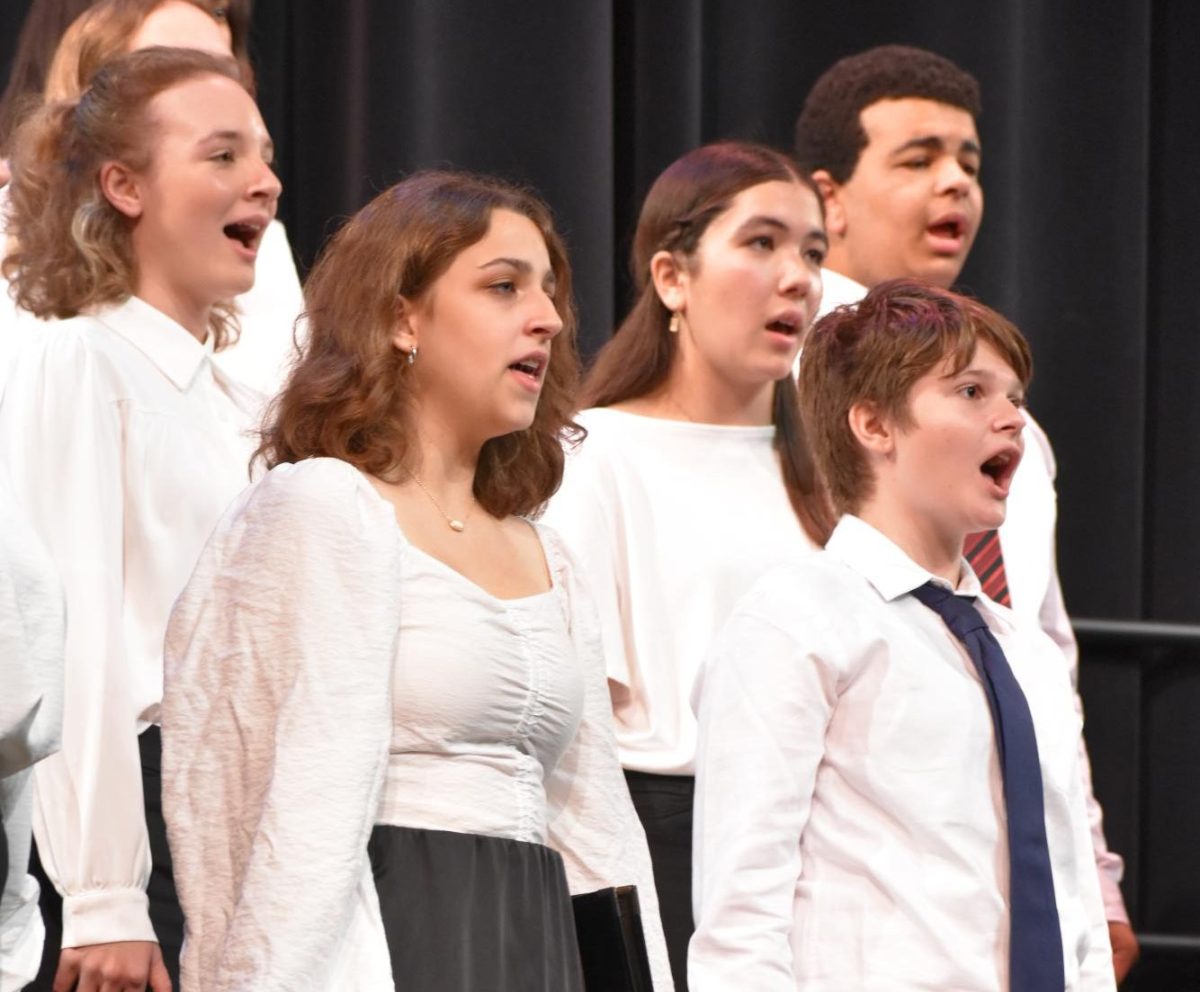 A+group+of+freshmen+performing+at+a+choir+concert.+The+concert+was+on+Tuesday%2C+Oct.+10%2C+2023.+