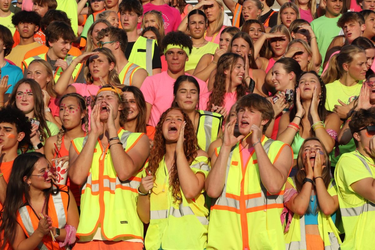 The LSW student section against Lincoln East fully participating in the neon theme. The next neon theme will be when LSW plays against LNS on Friday, Aug. 30, at Seacrest field.