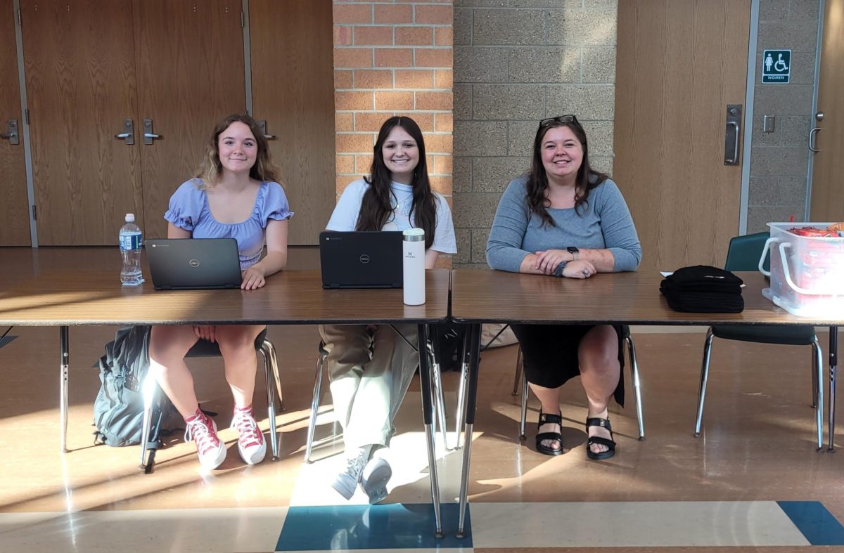 Volunteers at the sign-in table for the blood drive. 