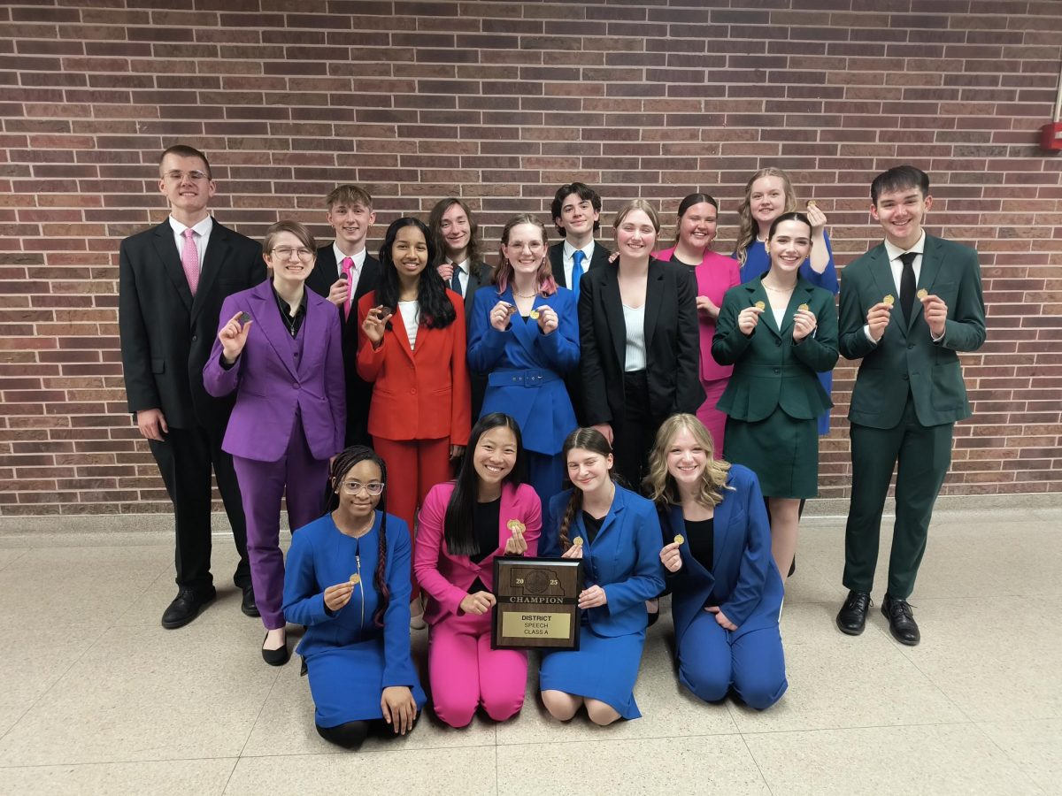 LSW speech posing for a photo after the  A-1 district speech competition. The LSW Forensics team has entered their postseason competitions and between Lincoln Public School’s spring break, competed in crucial tournaments on Saturday, March 8, and Saturday, March 15.