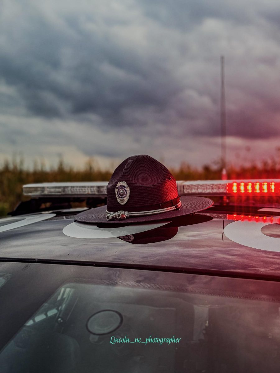 A Nebraska State Trooper's hat on top of a NSP Dodge Charger 