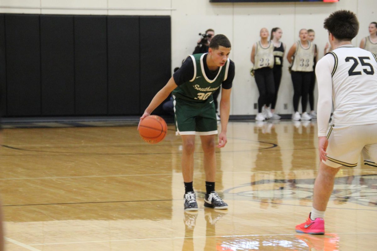 Dakari Wilson dribbles the ball down the court. Southwest defeated the Knights 76-69.